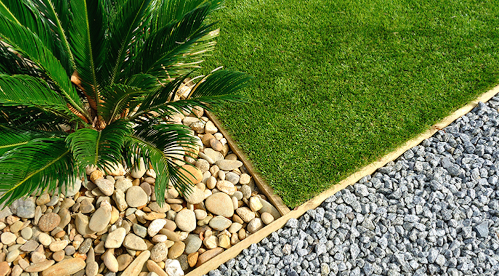 Lawn with pebbles around it