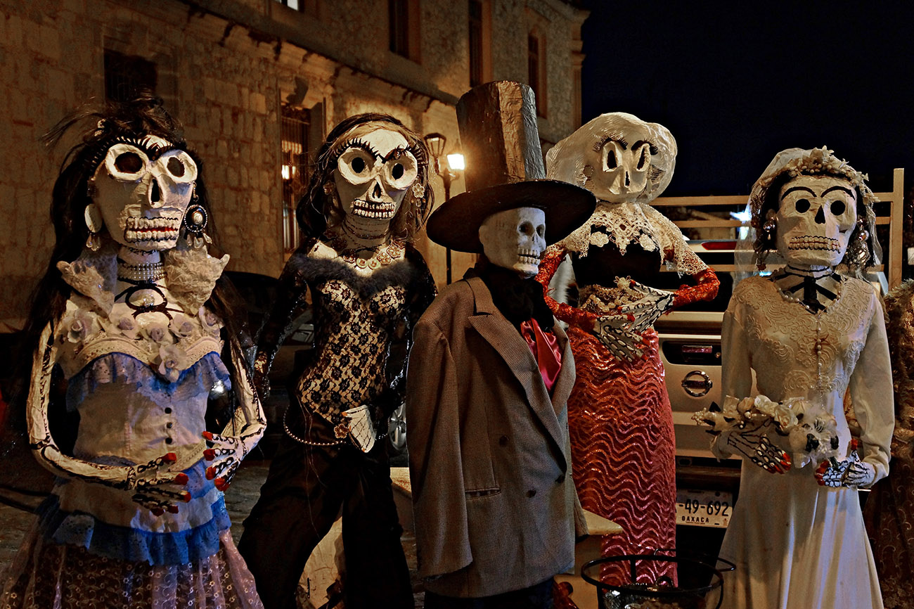 statues with masks