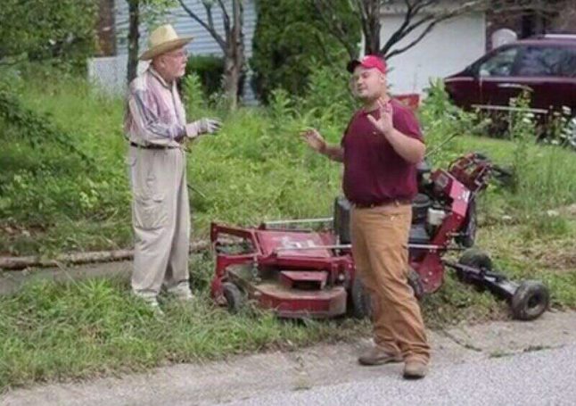 Alexander Gul of Bloomington, Ind., confronts a city-employed grass-cutter in 2005.