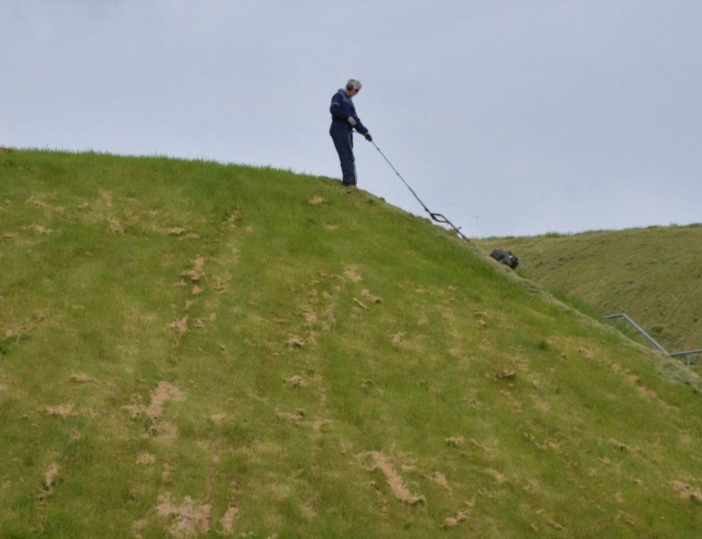 Mowing on a severe slope