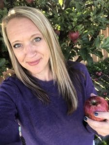 Author Amanda Shiffler and her apple tree