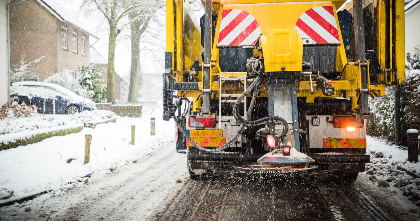 Winter truck spreading road salt