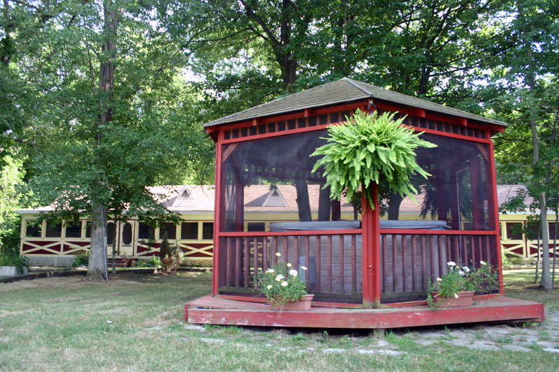 This gazebo shades a hot tub. 