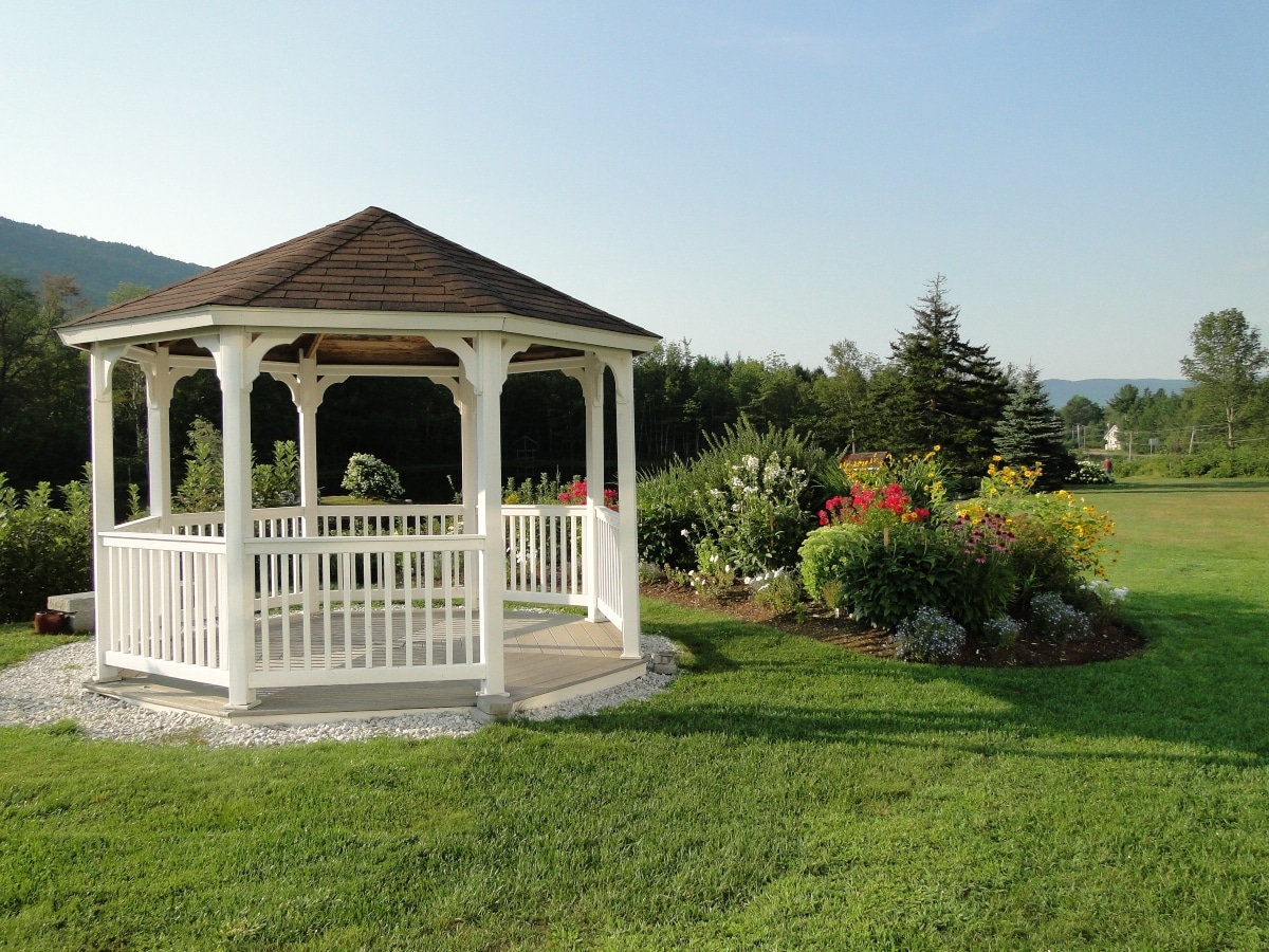 Landscape design with various plants and a gazebo