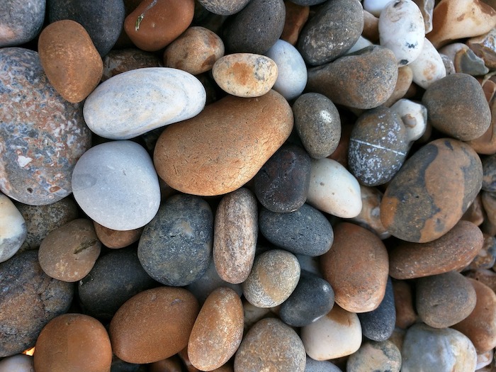 Brown, black, and white beach pebbles