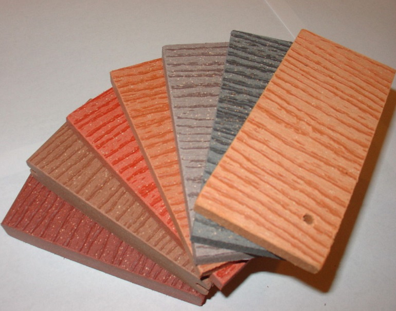 Different color samples of composite material that looks like wood