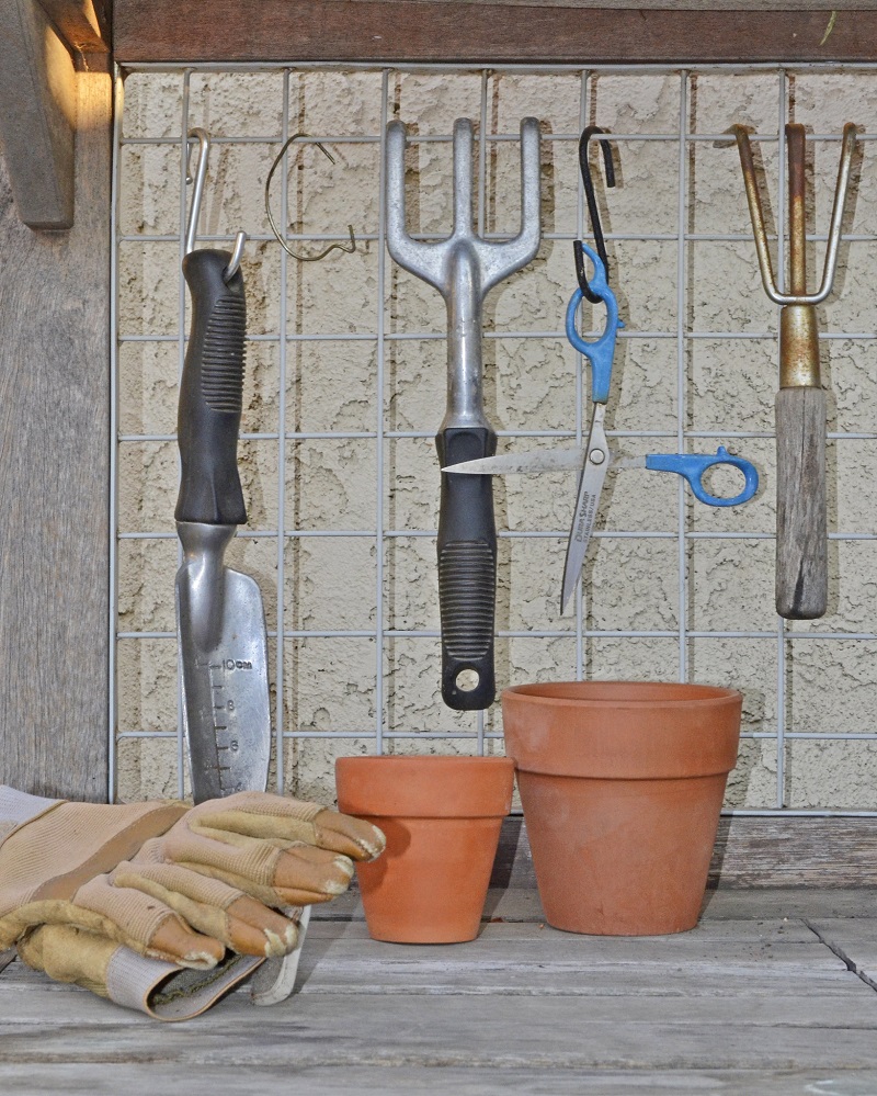 Garden hoe, scissors, garden gloves, and other gardening tools
