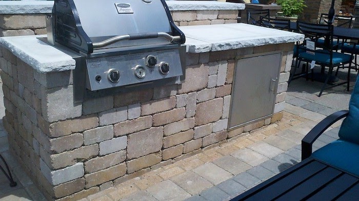 Outdoor kitchen made of landscaping blocks.