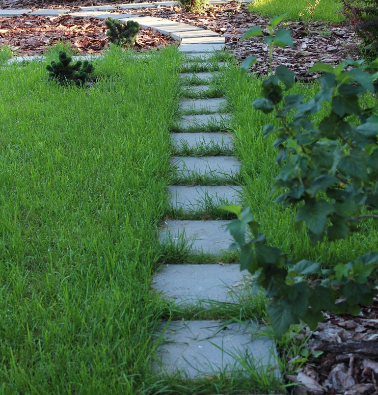 Spaced out pavers with grass in between