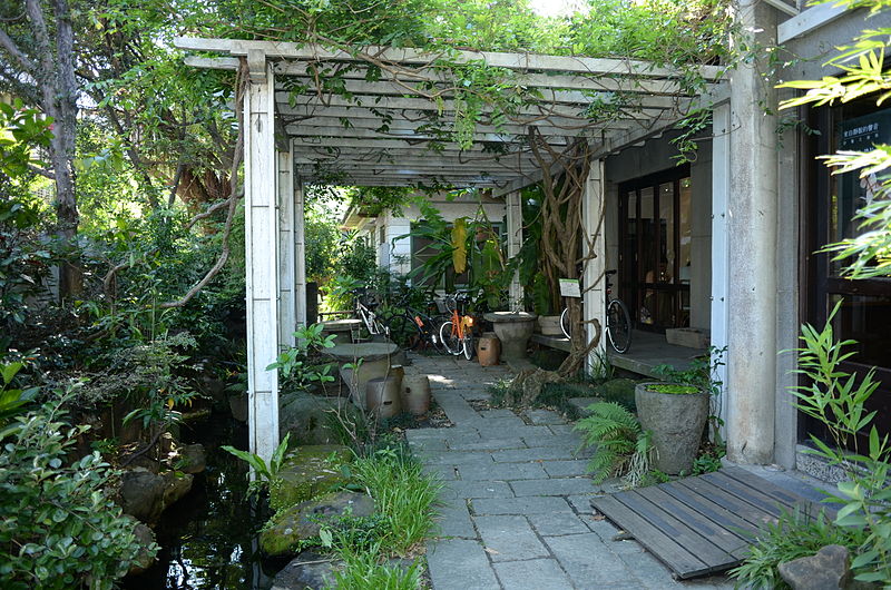 Pergola with vines growing over the top