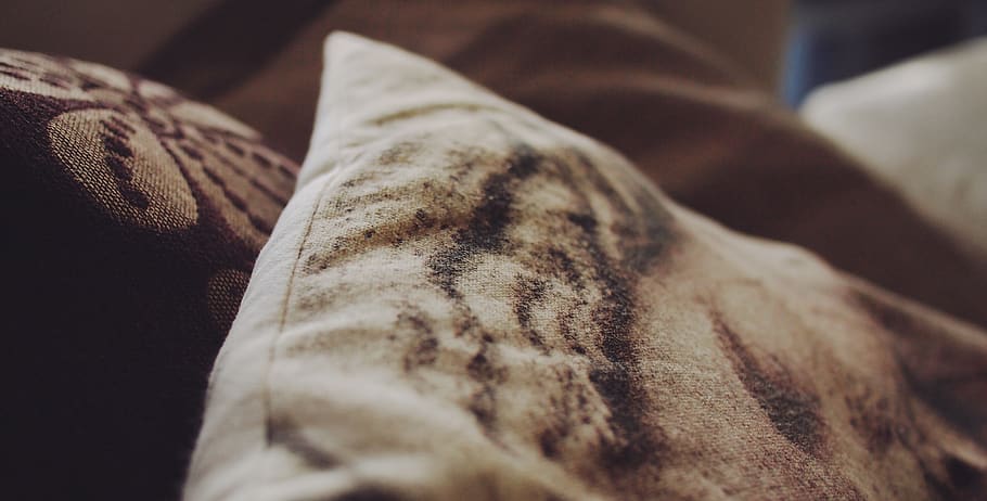 Closeup of white and brown pillow