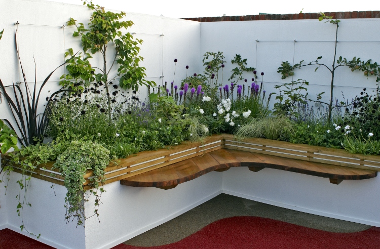 raised garden bed with seating