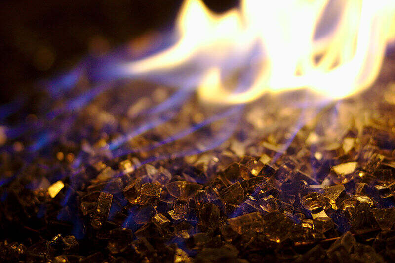 gas fire over a broken glass