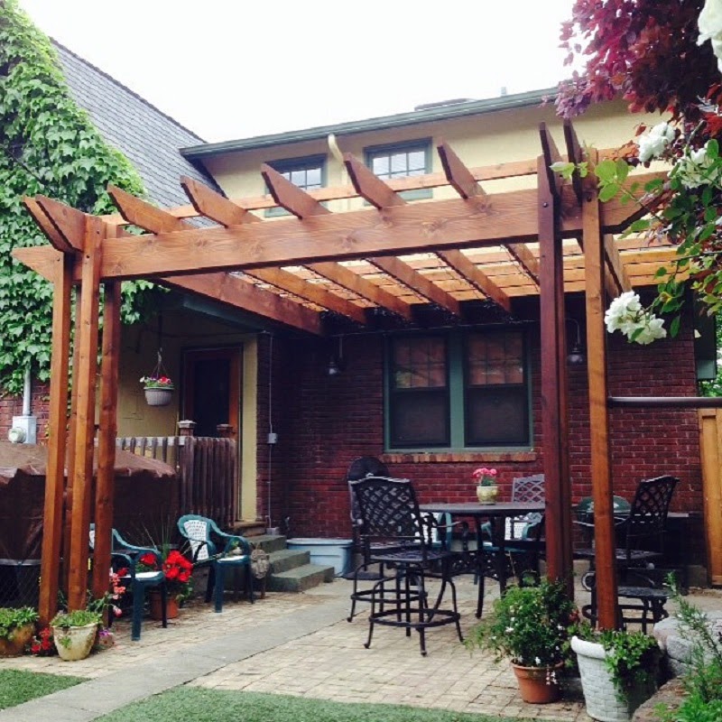 Wood pergola covering patio