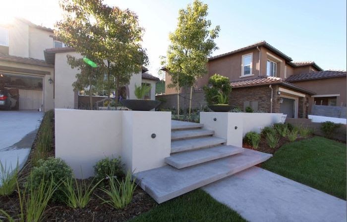 Rendered retaining wall in a modern landscape