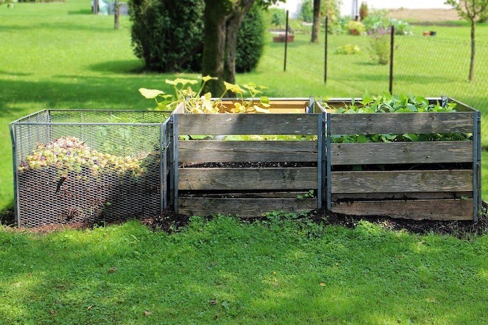 A composting system with three separate bins