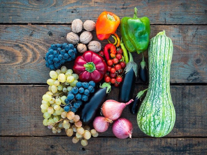 A display of vegetables on a wood surface