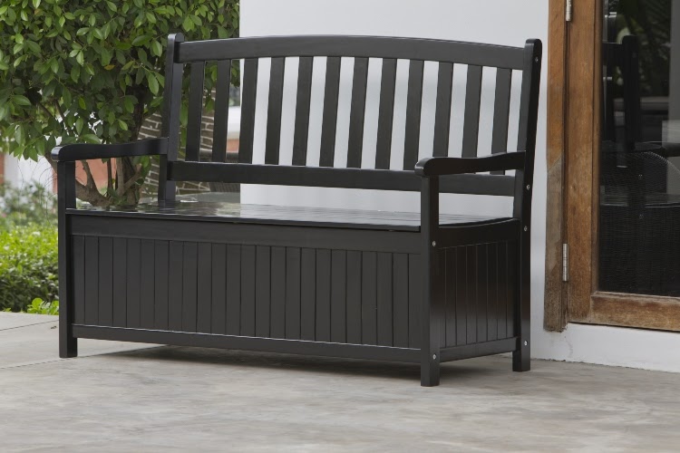 small patio with black storage bench