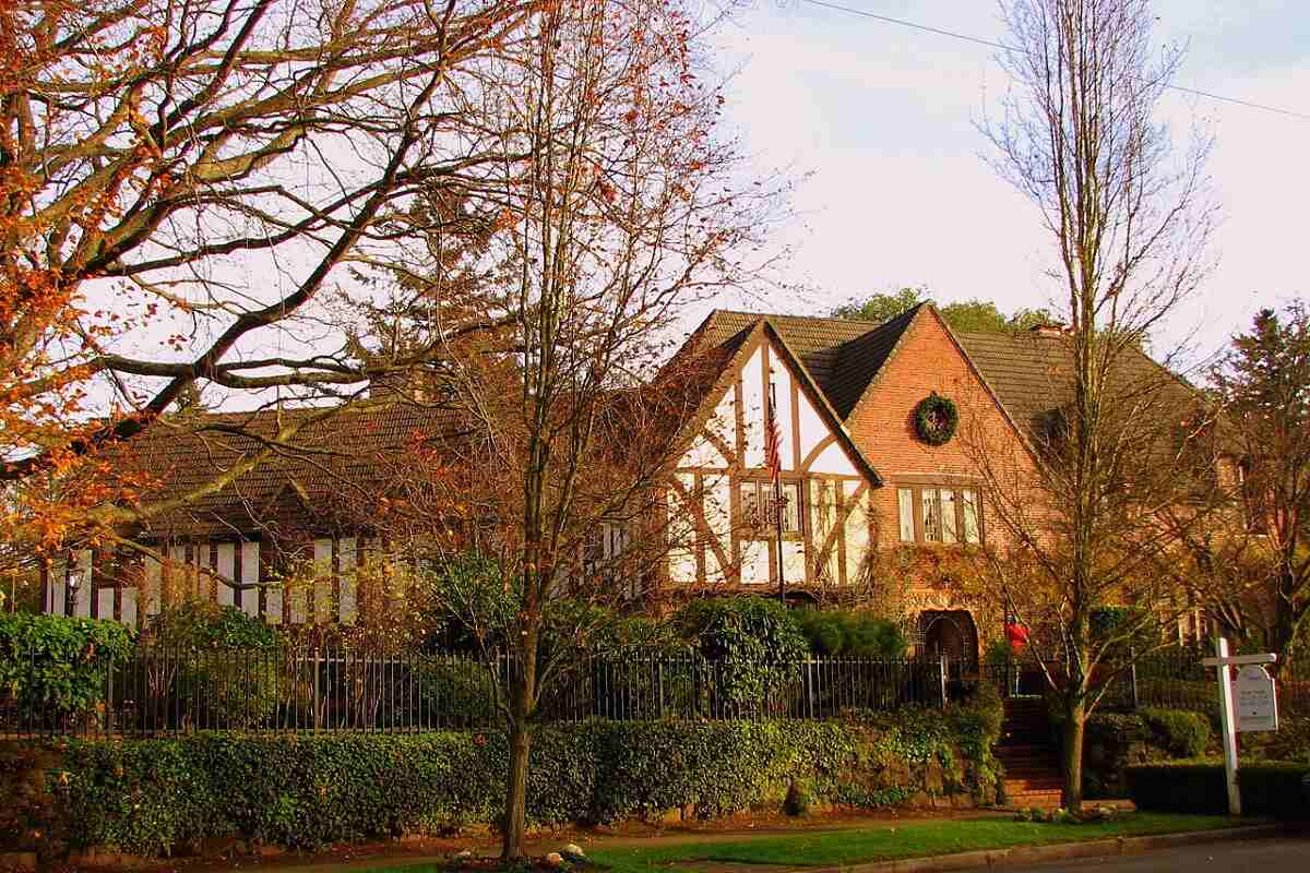 Portland cottage home with shrubs and trees