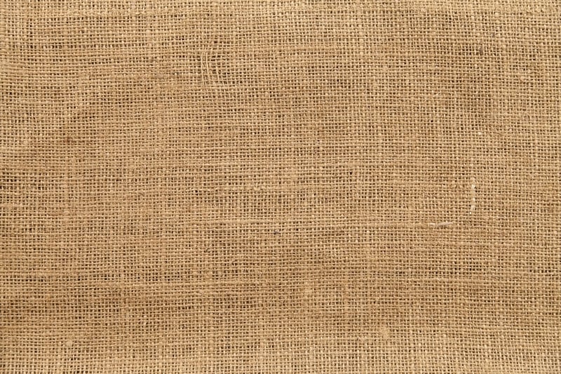 Close up of woven, burlap landscape fabric