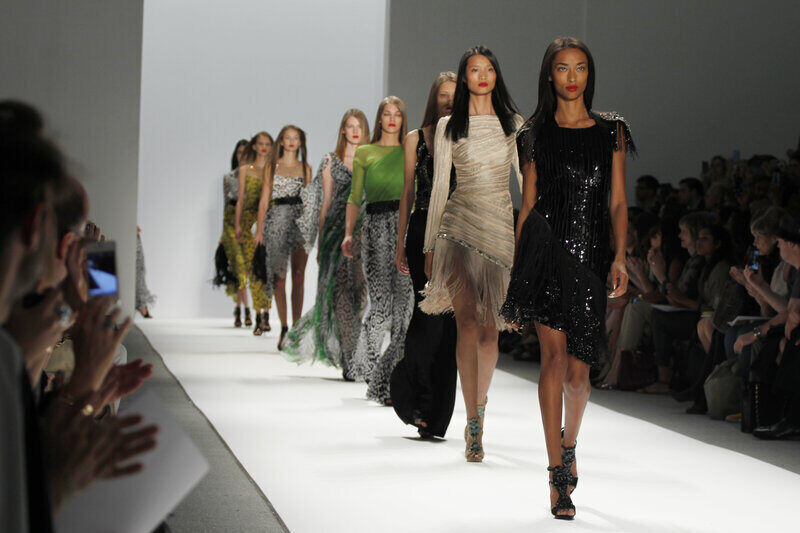 Models catwalking on a runway during a fashion show in New York City