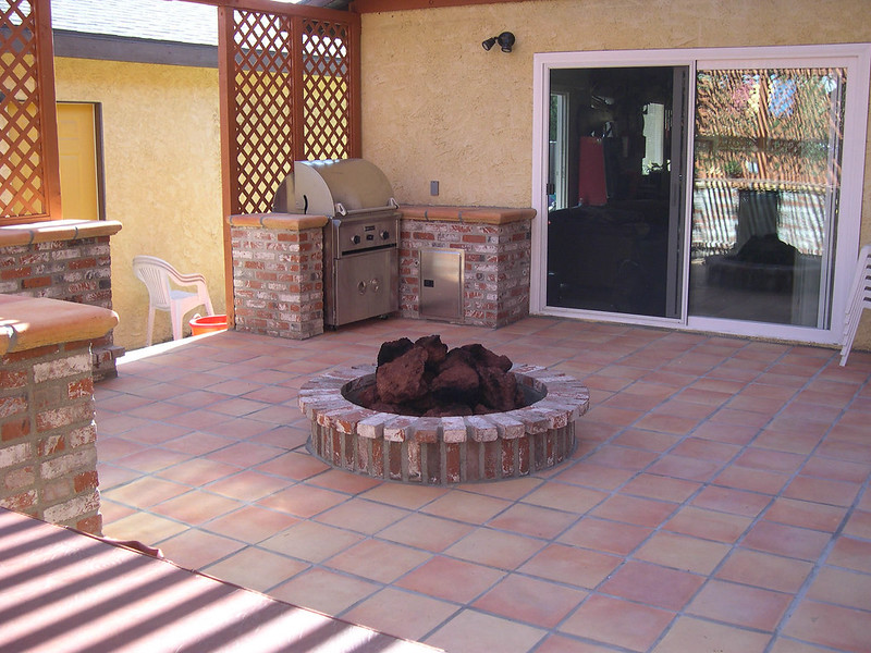 Fire pit in the middle of a covered patio