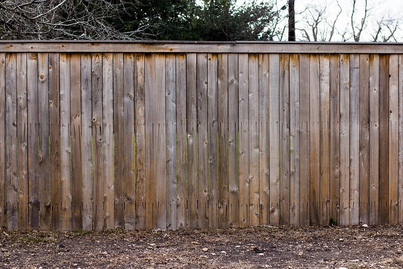 Tall wood fence