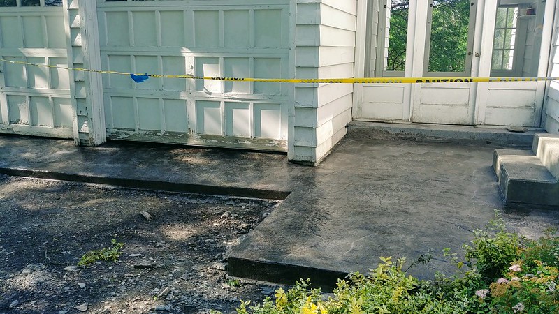 Sealed patio with caution tape around it