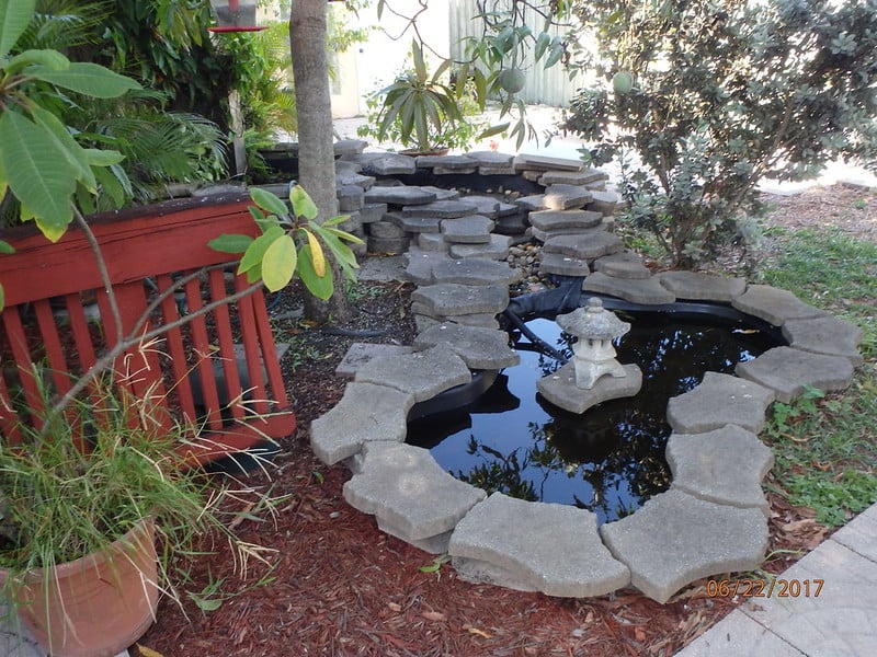 Backyard pond made using stones