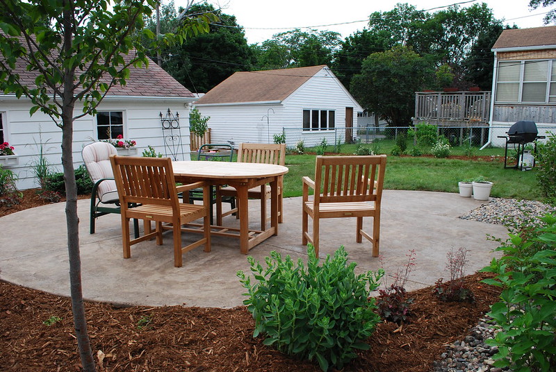 Round patio with a table and chairs