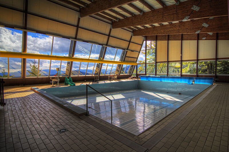 Indoor pool with full-sized glass windows around it