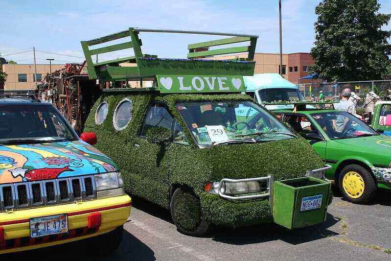 Van covered in turf grass