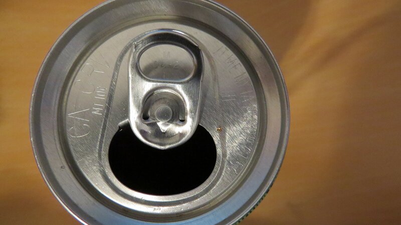 Close-up of the top of an aluminum pop can