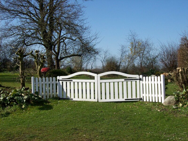 White, vinyl garden fence gate
