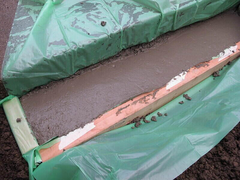 Fresh concrete in a mold, waiting to set