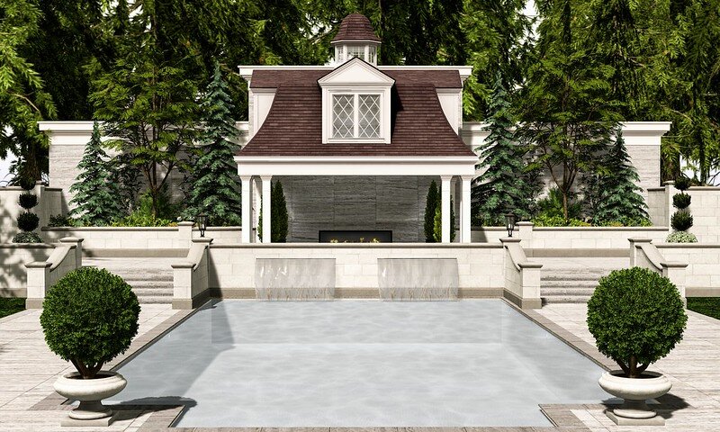 Pool house next to a backyard pool