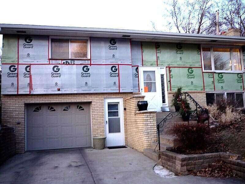 insullation put on a house beneath the siding