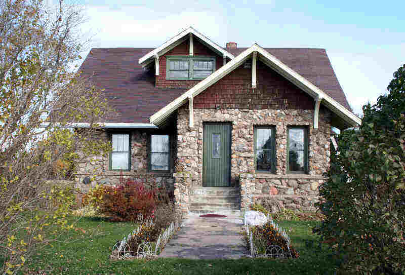 front-facing picture of a stone house