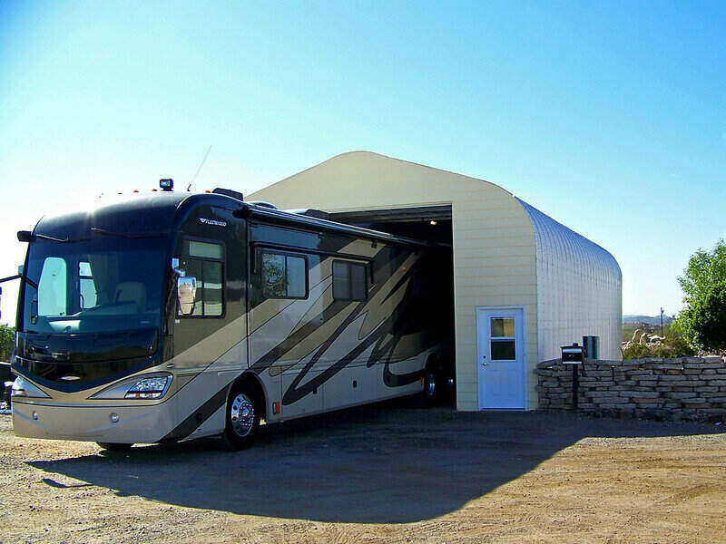 Large RV backed into a garage