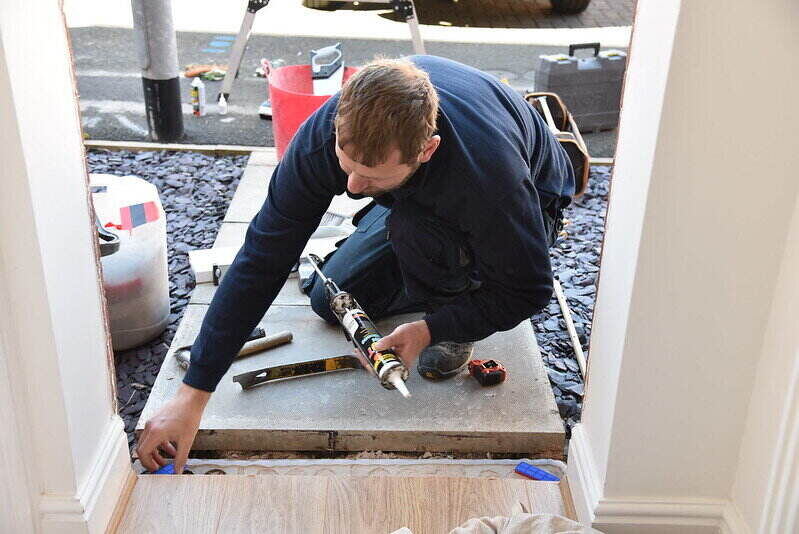 Man preparing to install a new door