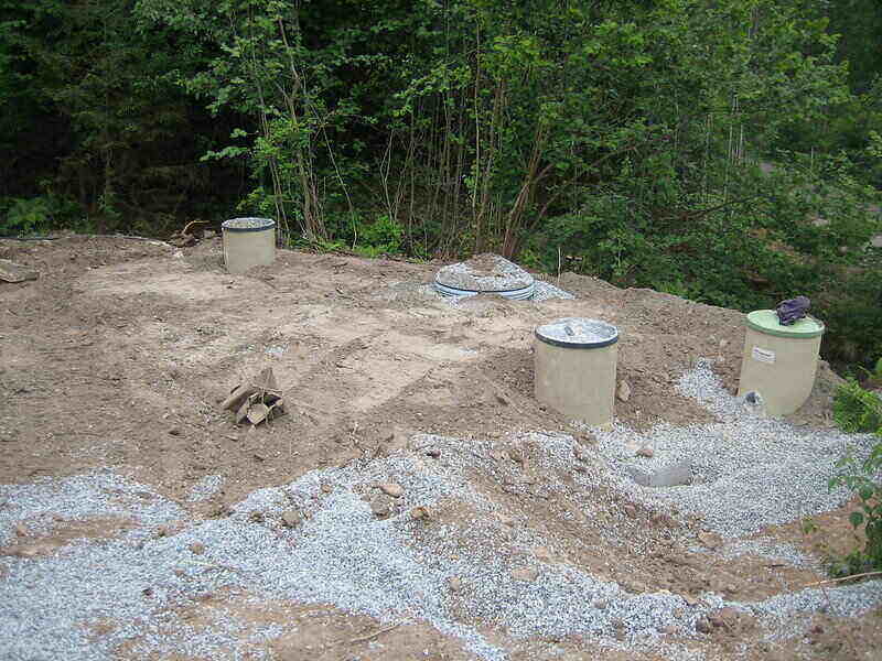 Septic tanks caps and filters raised up above the surface for easy access