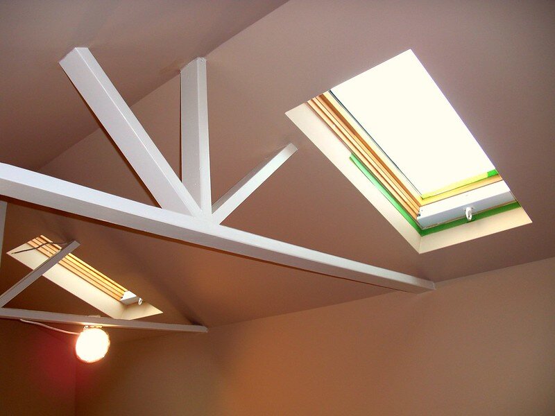 Skylights in a garage with decorative beams in the ceiling