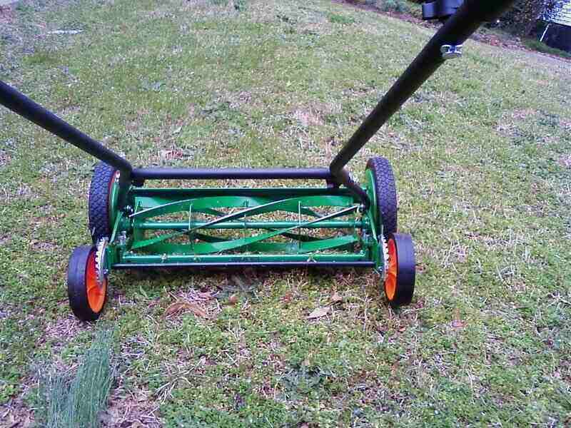 Reel lawn mower mowing a lawn