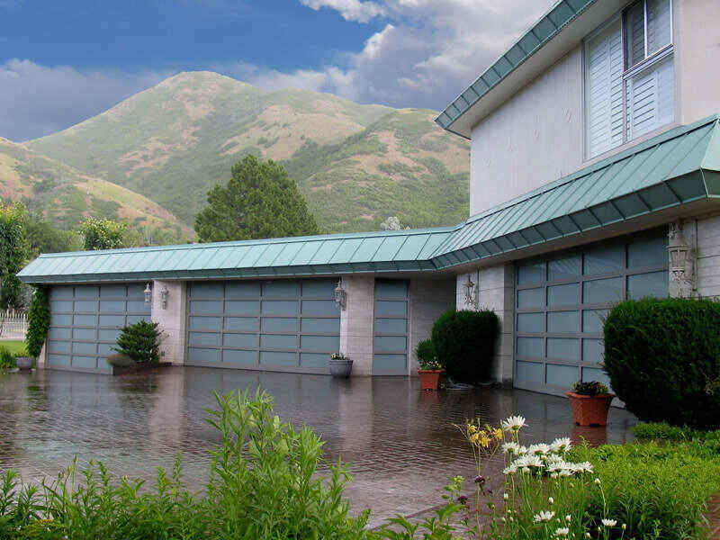 Large multi-car garage with 3 separate garage doors