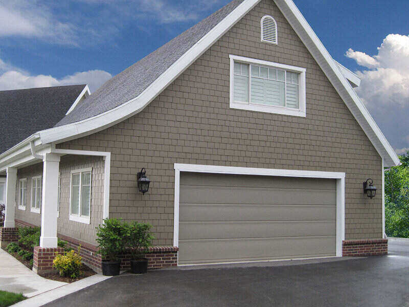 attached garage with a steep roof