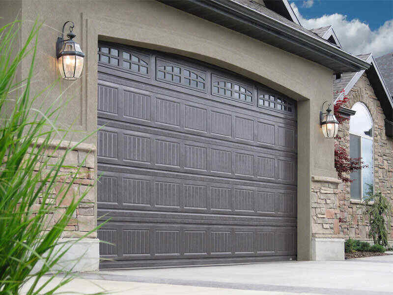 New garage door with windows across the top