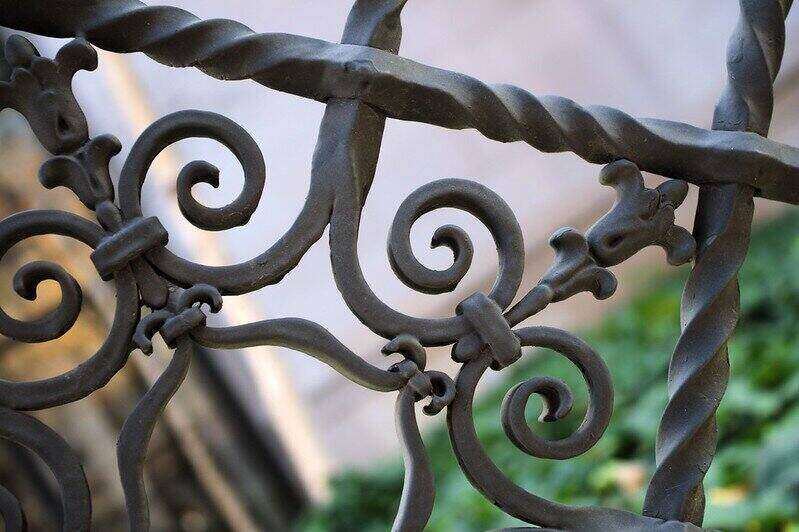 Close-up detail of an intricate iron gate