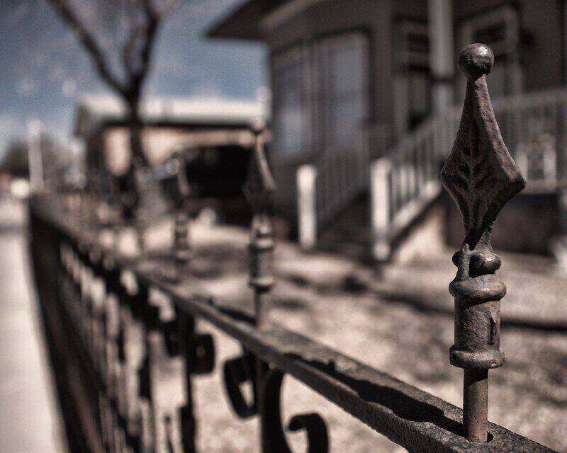 Close-up of the top of an iron fence