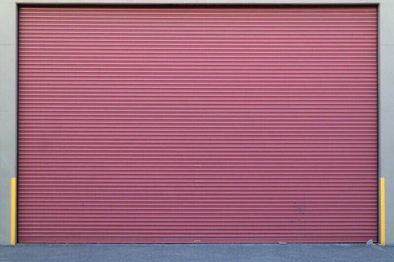 Maroon roll-up garage door