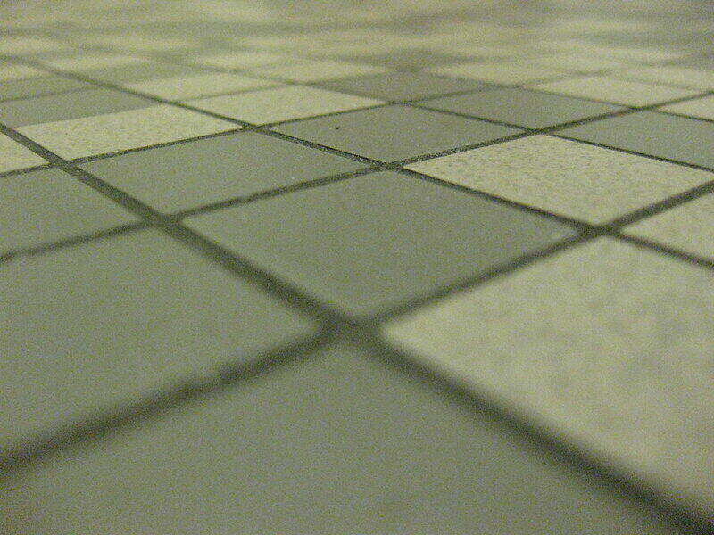 Close-up of grey tile and grout